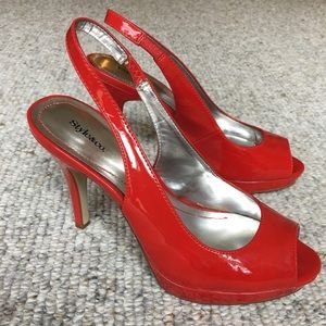 Red Peep toe sling back pumps